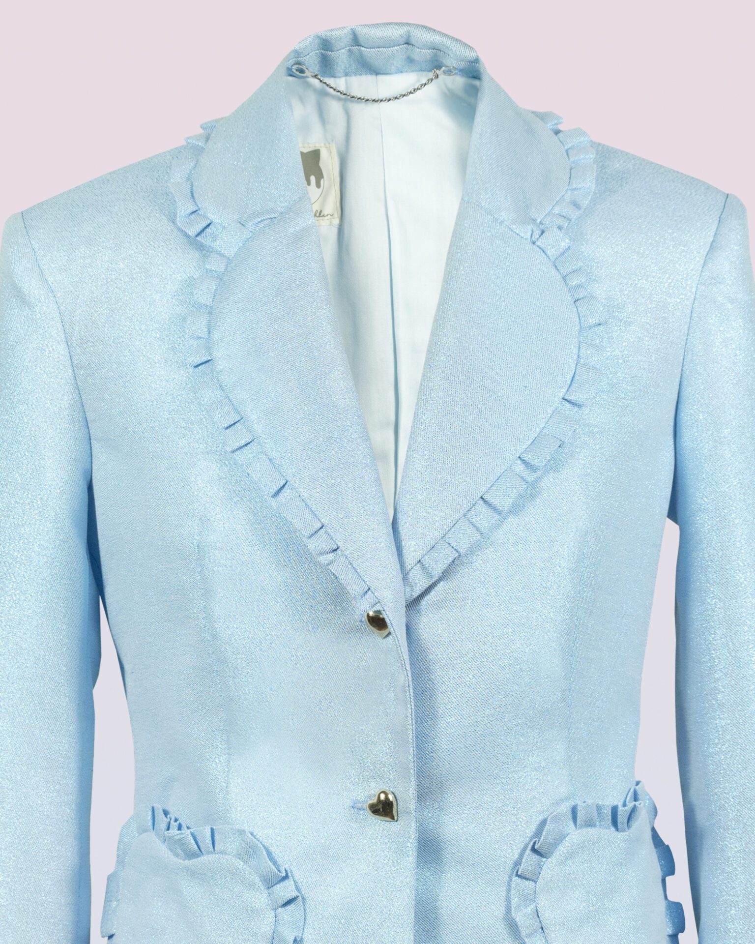 The fitted two-button jacket is made of iridescent linen/cotton blended fabric with metallic yarn