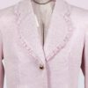 The fitted two-button jacket is made of iridescent linen/cotton blended fabric with metallic yarn
