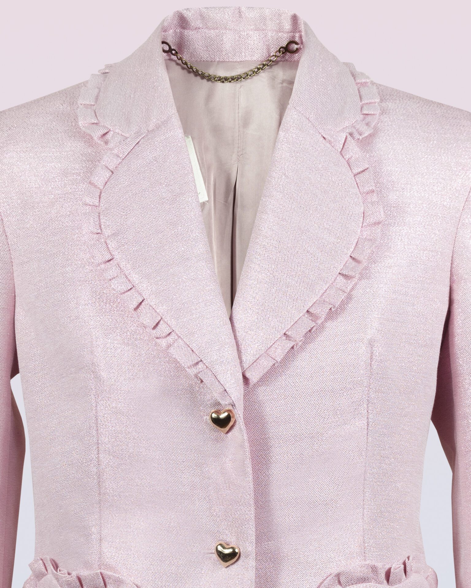 The fitted two-button jacket is made of iridescent linen/cotton blended fabric with metallic yarn