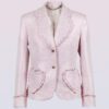 The fitted two-button jacket is made of iridescent linen/cotton blended fabric with metallic yarn