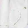 The fitted two-button jacket is made of iridescent linen/cotton blended fabric with metallic yarn