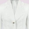 The fitted two-button jacket is made of iridescent linen/cotton blended fabric with metallic yarn