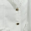The fitted two-button jacket is made of iridescent linen/cotton blended fabric with metallic yarn