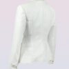 The fitted two-button jacket is made of iridescent linen/cotton blended fabric with metallic yarn