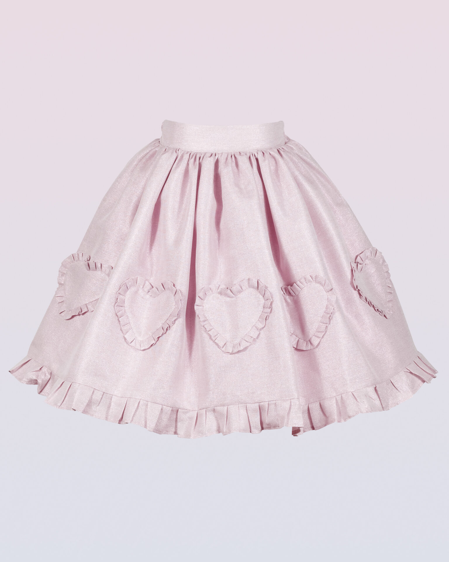 The iridescent skirt with a ruffled hem is made of cotton/linen blended fabric with metallic yarn.
